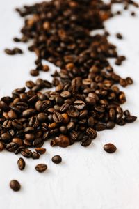 Kaboompics - Coffee Beans in Soft Focus on White for Warm Cafe Social Media Backgrounds