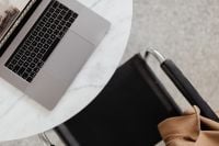 Kaboompics - MacBook Pro 15 laptop and iPhone 11 Pro on a marble table