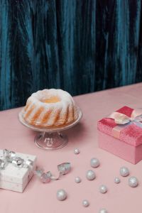 Kaboompics - Bundt Cake with Christmas Gifts and Silver Baubles