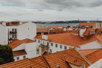 Kaboompics - Terracotta Rooftops across Lisbon with the Tagus Estuary in the Distance