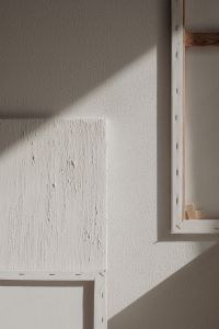 Kaboompics - Layered White Paint Sample with Strong Diagonal Shadow