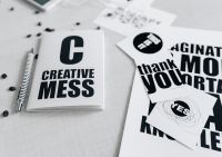 Kaboompics - Black and White Typography Cards with Notebook and Coffee Beans