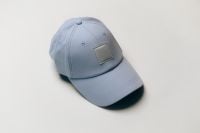 Kaboompics - Blue Baseball Cap Angled on a White Background