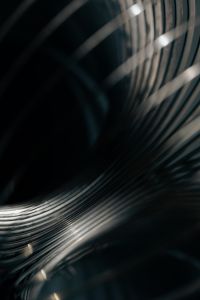 Kaboompics - Curved Silver Spring Lines with Deep Shadows