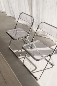 Kaboompics - Chrome Folding Chairs beside Sheer Curtains