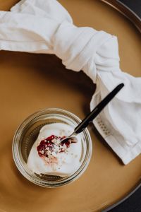 Kaboompics - Yogurt and Berries on a Brown Serving Tray with Linen