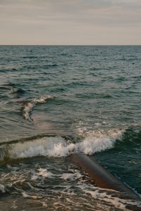 Kaboompics - Concrete Pipe Wave Foam Baltic Beach Golden Hour