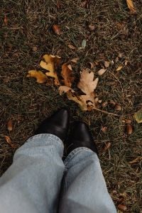 Kaboompics - Black Ankle Boots Among Fallen Oak Leaves Viewed from Above