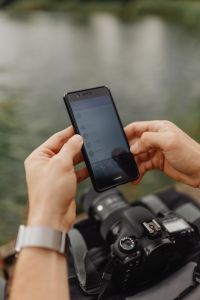 Kaboompics - Portrait Smartphone and DSLR Camera at the Lakeside