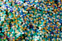 Kaboompics - Blue and Gold Sequins with Teal Bokeh, Wide Abstract Fabric Background