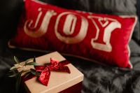 Kaboompics - Wrapped Gift Box on a Dark Bedspread