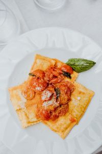 Kaboompics - Ravioli with Tomato Sauce, Parmesan and Fresh Basil