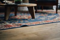 Kaboompics - Patterned Blue Rug beneath Wooden Coffee Table