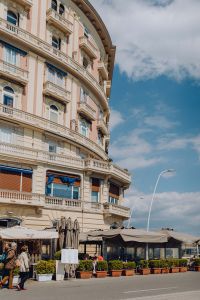 Kaboompics - Curved Naples Waterfront Building With Outdoor Restaurant Terrace