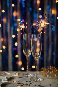 Kaboompics - Pair of Champagne Sparklers with Vertical Blue and Silver Fringe