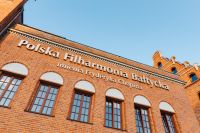 Kaboompics - Polish Baltic Philharmonic in Gdańsk: Red Brick Facade and Chopin Inscription