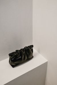 Kaboompics - Cloud Dancer White Interior with Black Leather Handbag