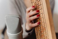 Kaboompics - Wooden Tactile Sound Prop beside Studio Microphone for ASMR Tapping Audio