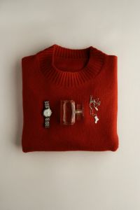 Kaboompics - Burgundy Sweater with Watch Perfume and Necklace Flat Lay