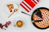 Kaboompics - Christmas Blueberry Pie with Coffee, Red Berry Sprig and Striped Gift