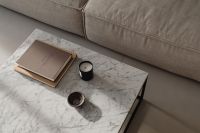 Kaboompics - Overhead Beige Living Room with Books and Marble Coffee Table