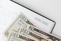 Kaboompics - U.S. Dollar Bills on 2020–2022 Calendar Pages