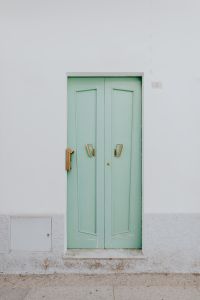 Kaboompics - Mint Green Double Door on a Minimal White Exterior
