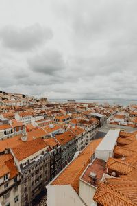 Kaboompics - Vertical Lisbon Cityscape of Historic Rooftops beneath a Cloudy Sky