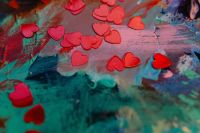 Kaboompics - Red Heart Confetti on Colorful Abstract Art Background