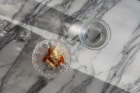Kaboompics - Overhead Supplement Bowl and Water Glass on Marble
