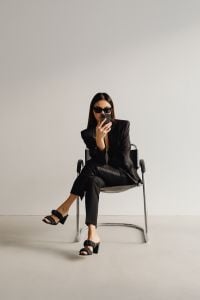 Kaboompics - Businesswoman in Sunglasses Sitting in a Chair