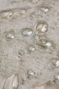 Kaboompics - Soft-Focus Macro of Raised Glass Bubbles on Neutral Ground