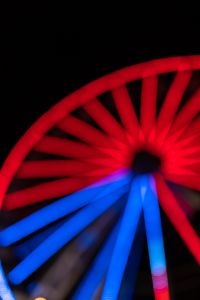 Kaboompics - Red and Blue Ferris Wheel Lights in a Vertical Crop