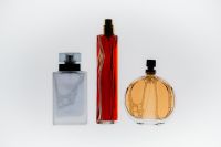 Kaboompics - Minimal Perfume Bottle Flat Lay Background