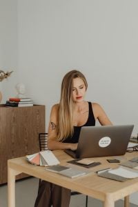 Kaboompics - Interior Designer Preparing Material Specification on Laptop