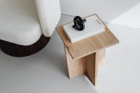 Kaboompics - Bouclé Chair and Oak Table with a Black Sculptural Object