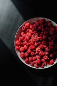 Kaboompics - Bowl of Raspberries in Dramatic Side Light