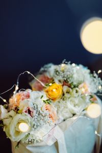 Kaboompics - Bouquet of flowers in a bag with some fairy lights