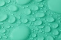 Kaboompics - Mint Green Droplet Texture With Large Organic Shapes