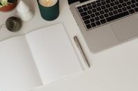 Kaboompics - Small Christmas Trees Beside Laptop and Blank Notebook
