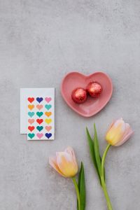 Kaboompics - Tulips, Heart Chocolates, and Colorful Love Card Flatlay