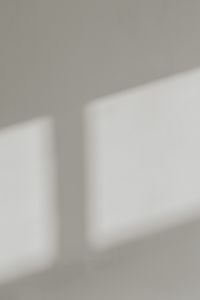 Kaboompics - Minimal White Wall Wallpaper with Rectangular Sunlight