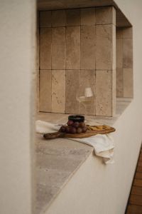 Kaboompics - Grapes, Cheese Board and Wine in Travertine Interior