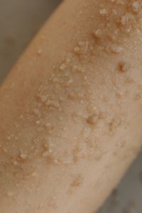 Kaboompics - Macro Texture of Sea Salt Scrub on Skin for Body Care