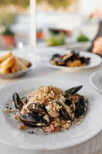 Kaboompics - Seafood Risotto with Mussels and Clams at Italian Table