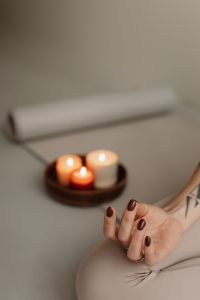 Kaboompics - Meditation Hand and Candle Arrangement in Soft Focus