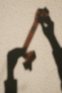 Kaboompics - Shadow Of Hands Holding A Film Strip