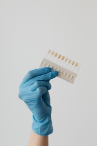 Kaboompics - Tooth Color Samples on Dental Shade Guide With Copy Space