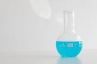 Kaboompics - Blue, Yellow and Pink Flasks in a Chemistry Still Life