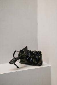 Kaboompics - Black Woven Heel with Ruched Handbag Close-Up